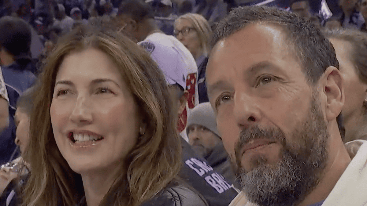 Adam Sandler Ditches Hoodie for WNBA Game—But Still Can't Dress Up for Wife's Premiere