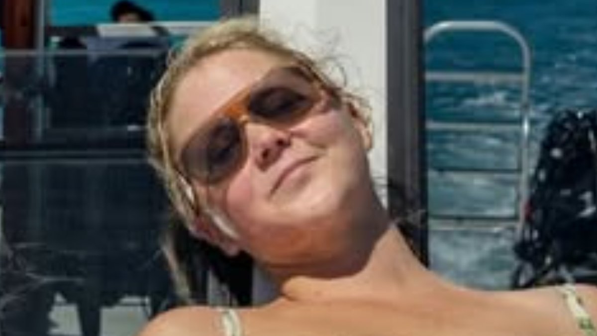 Amy Schumer's 50-Pound Weight Loss Journey Takes a Dive in Stunning Swimsuit Photos