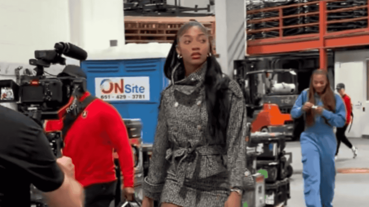 Angel Reese Stuns in Silver Mini Skirt for Dream Debut — Fans Go Wild