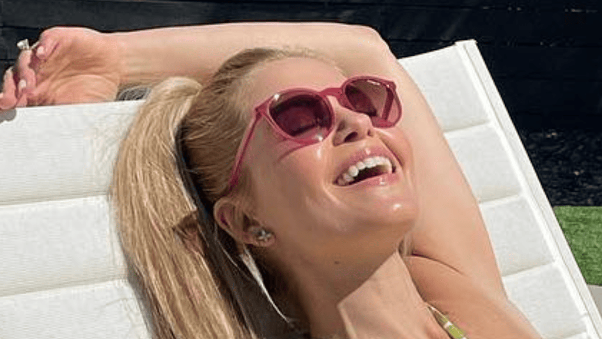 At 50, 'Full House' Star Turns Heads with Fishing Trip Swimsuit Photo