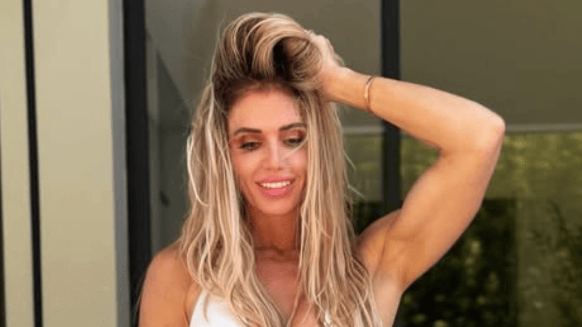 At 50, Torrie Wilson's Swimsuit Photo Has WWE Universe Buzzing