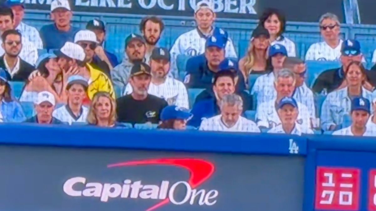 Behind Home Plate PDA Steals the Show (and Fans' Patience) in NLCS Game 3