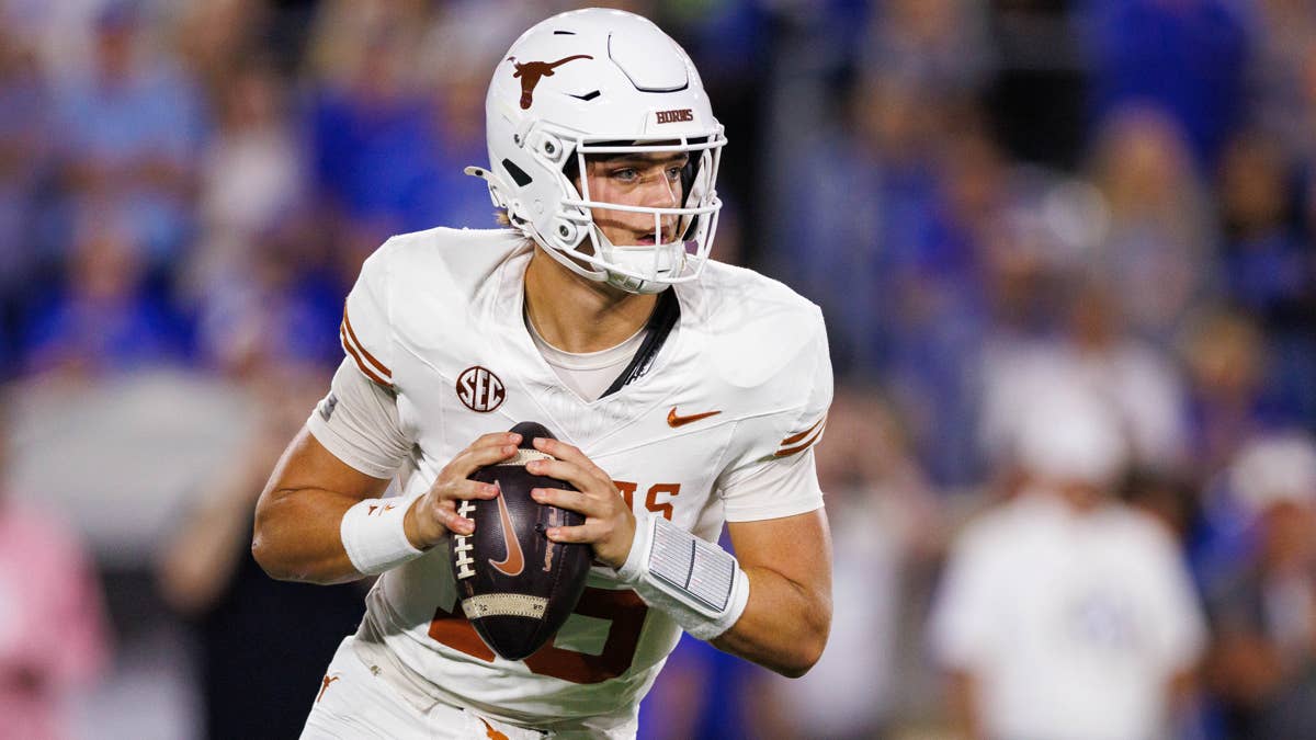Arch Manning in a white Texas Longhorns uniform with SEC logo, holding a football.