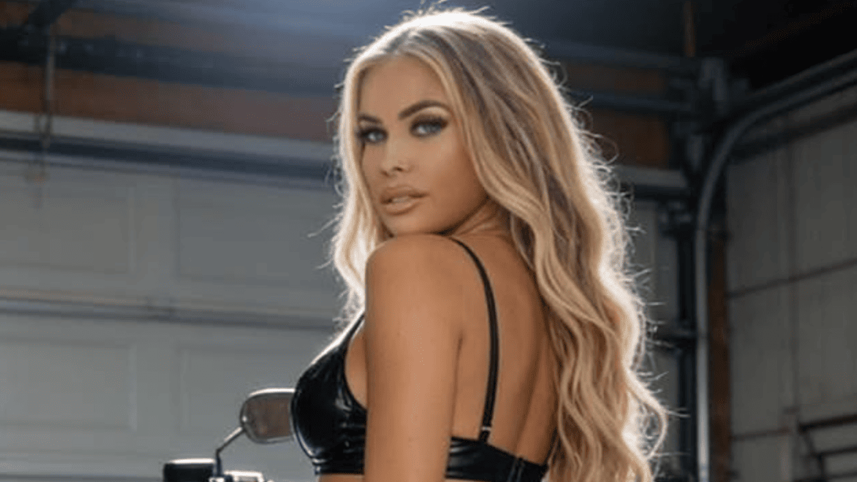 Carmen Electra, 53, Revs Up Social Media with Motorcycle Swimsuit Stunner