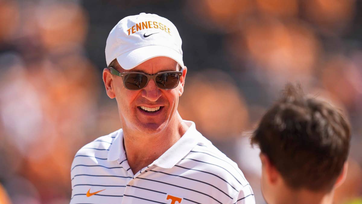 Manning's Family First: Peyton Backs Arch Over Tennessee