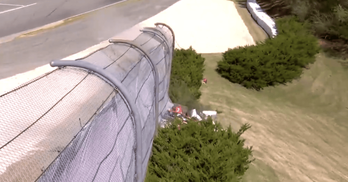 McLaughlin Walks Away from Barber Park Fence-Shattering Crash