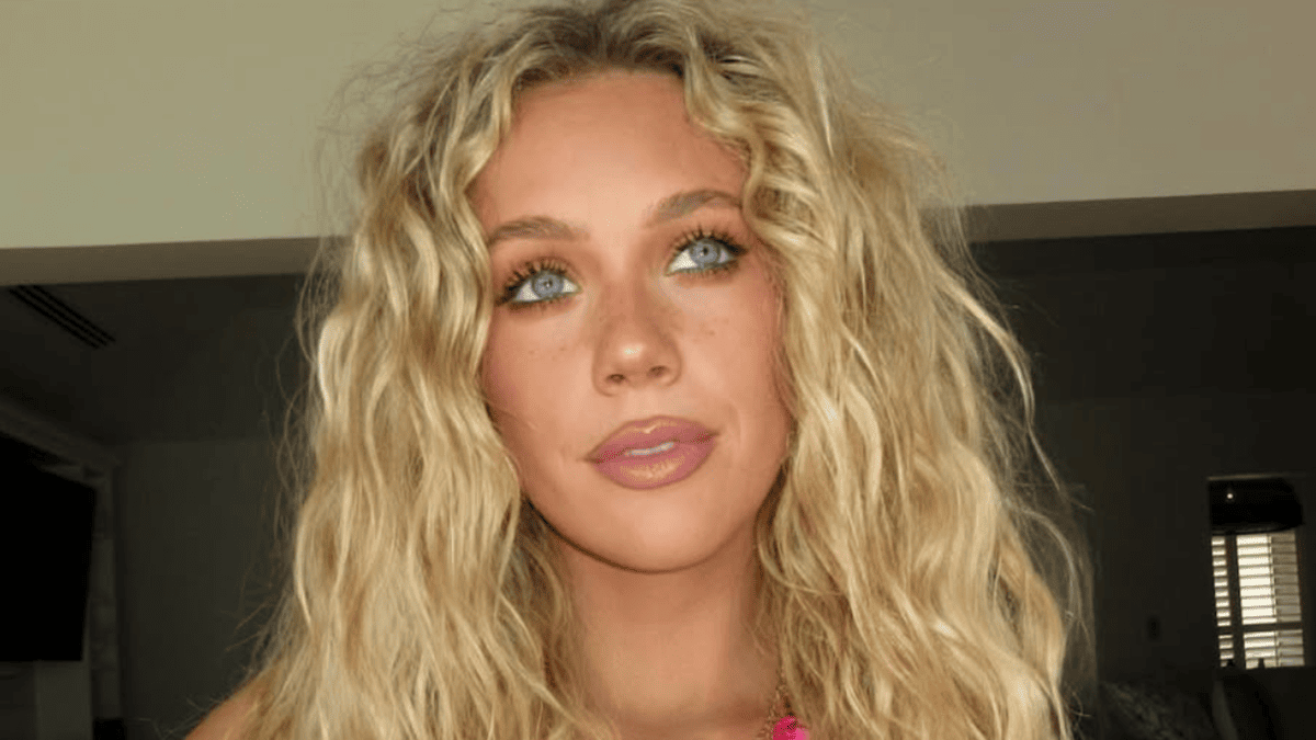 Megan Moroney's Beachside Swimsuit Snap Has Fans Dropping Jaws