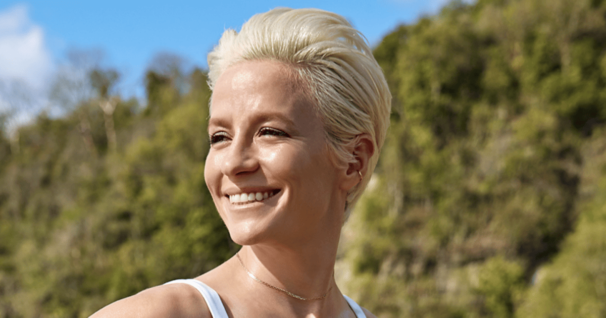 Megan Rapinoe Stuns in White Swimsuit, Ignites Firestorm with Hockey Team Critique