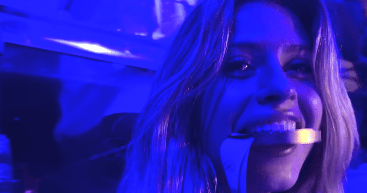 Mystery Woman Wearing USA Hockey Gold Medal Revealed as Sports Illustrated Star