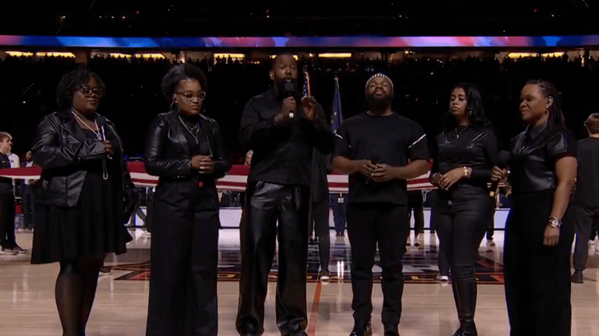 National Anthem Performance Electrifies Crowd Before Championship Tip-Off