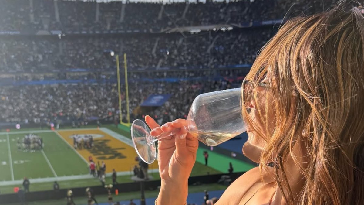 Nikki Bella Turns Heads at NFL Paris Game with Fiery Outfit