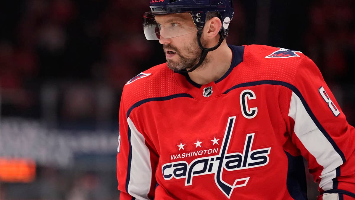 Alex Ovechkin in a red Washington Capitals jersey with the letter C on the chest and the number 8 on his sleeve.
