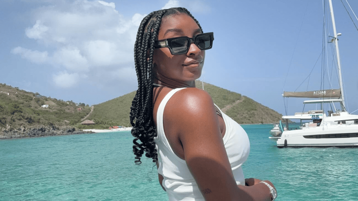 Simone Biles Turns Heads with Dazzling Blue Swimsuit Snap