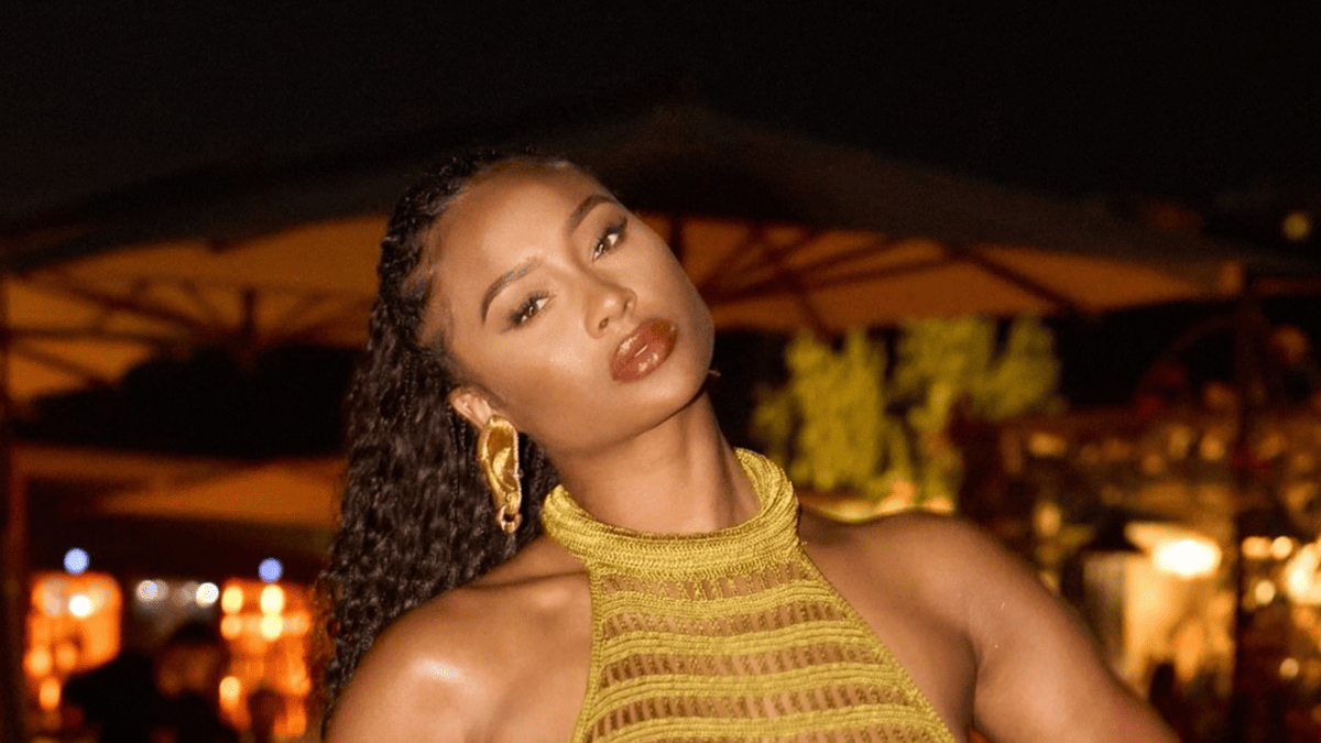 Travis Kelce's Ex Kayla Nicole Turns Heads in Ibiza Summer Dress
