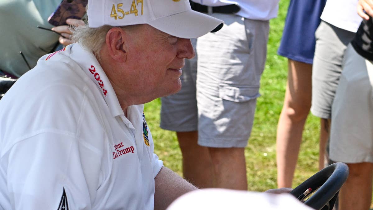 Trump's Bruised Arm at LIV Golf Has Supporters Buzzing